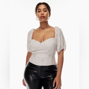 Aritzia/Wilfred floral short sleeve novella blouse